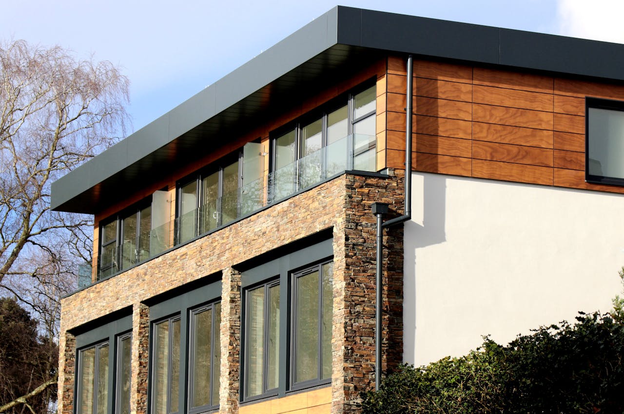 maison avec mixte d'architecture en pierre et bois design